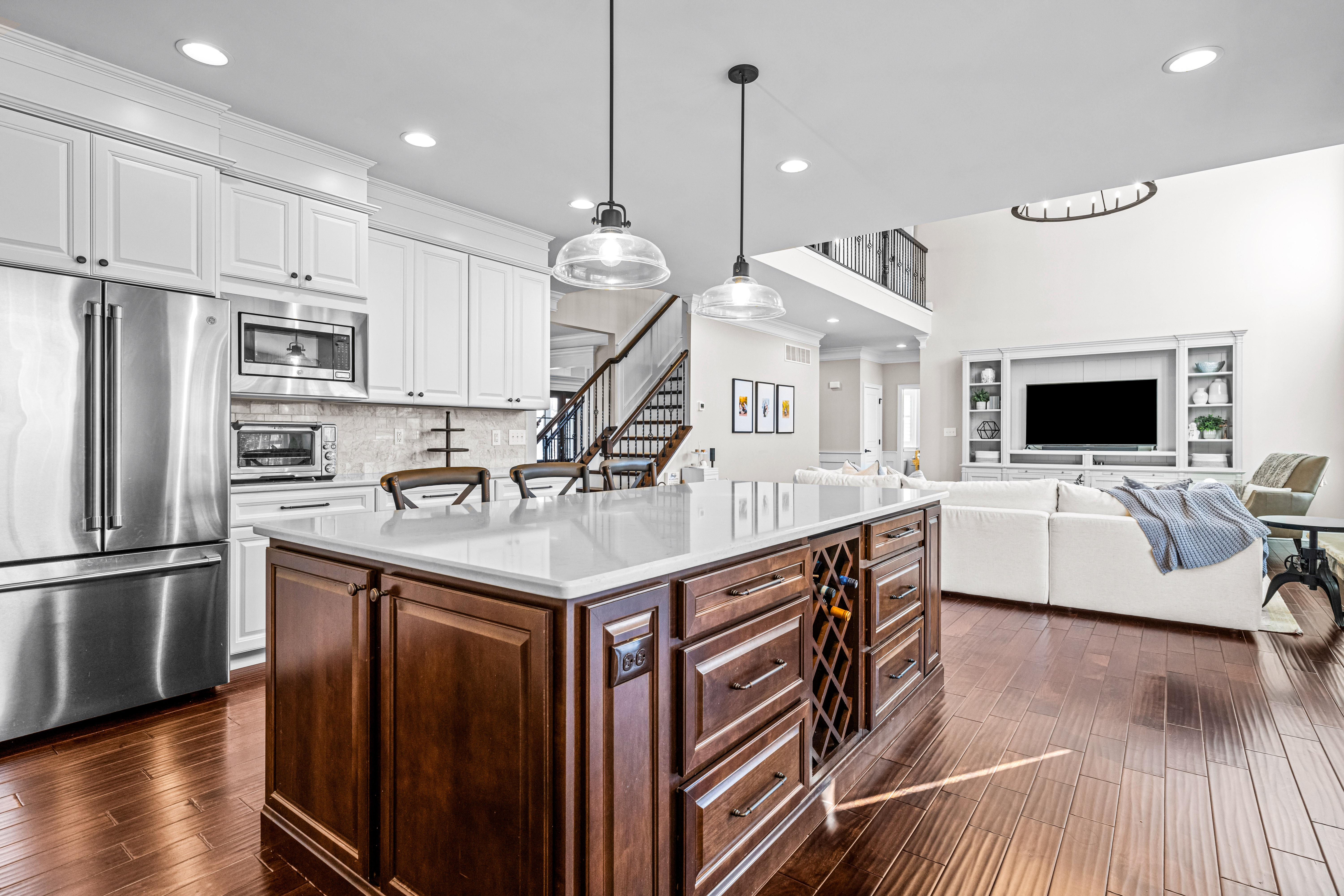 52 Wellesley Way Marlton, NJ 08053 - Photo 51 of 98 a kitchen with stainless steel appliances kitchen island a large counter top space a sink and a wooden floors