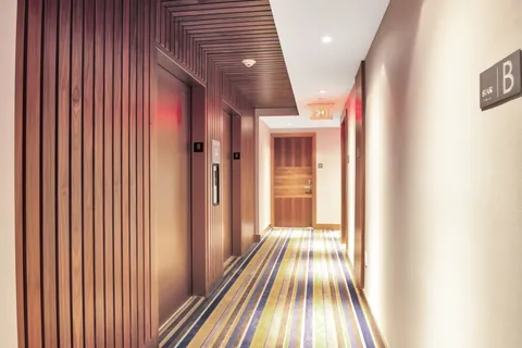 a view of a terrace with couches and potted plants