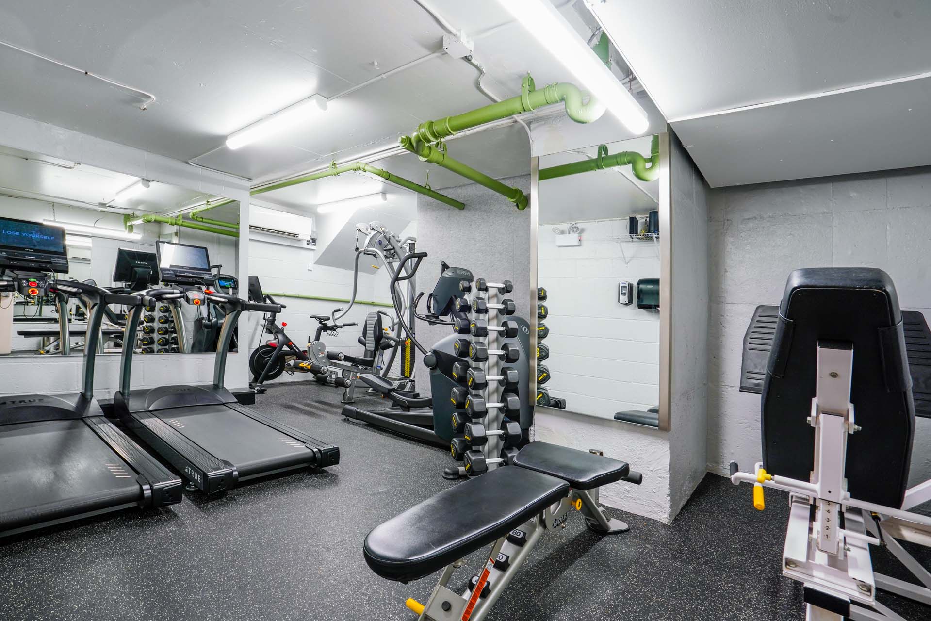 301 East 75th Street, Unit 2G Manhattan, NY 10021 - Photo 10 of 14 a room with gym equipment