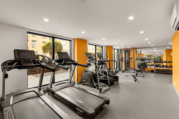 605 Hart Street, Unit 6E Brooklyn, NY 11221 - Photo 9 of 10 a view of a room with gym equipment
