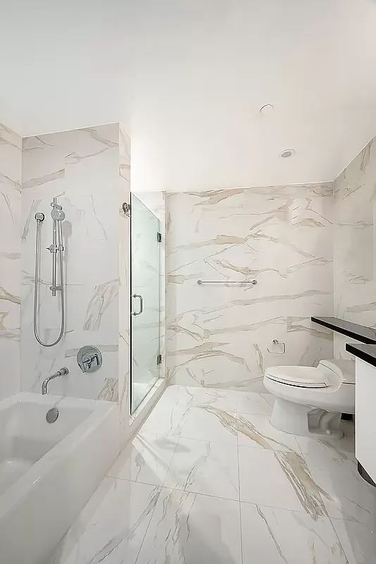 84 White Street, Unit 4A Manhattan, NY 10013 - Photo 6 of 7 a bathroom with a toilet sink and shower