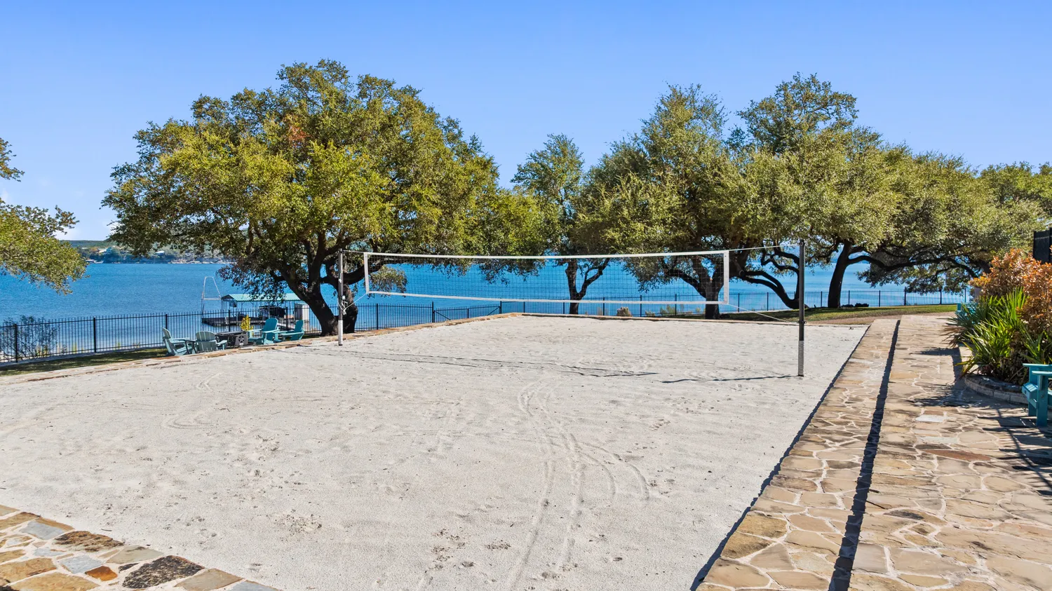 a kitchen with stainless steel appliances a sink stove and cabinets