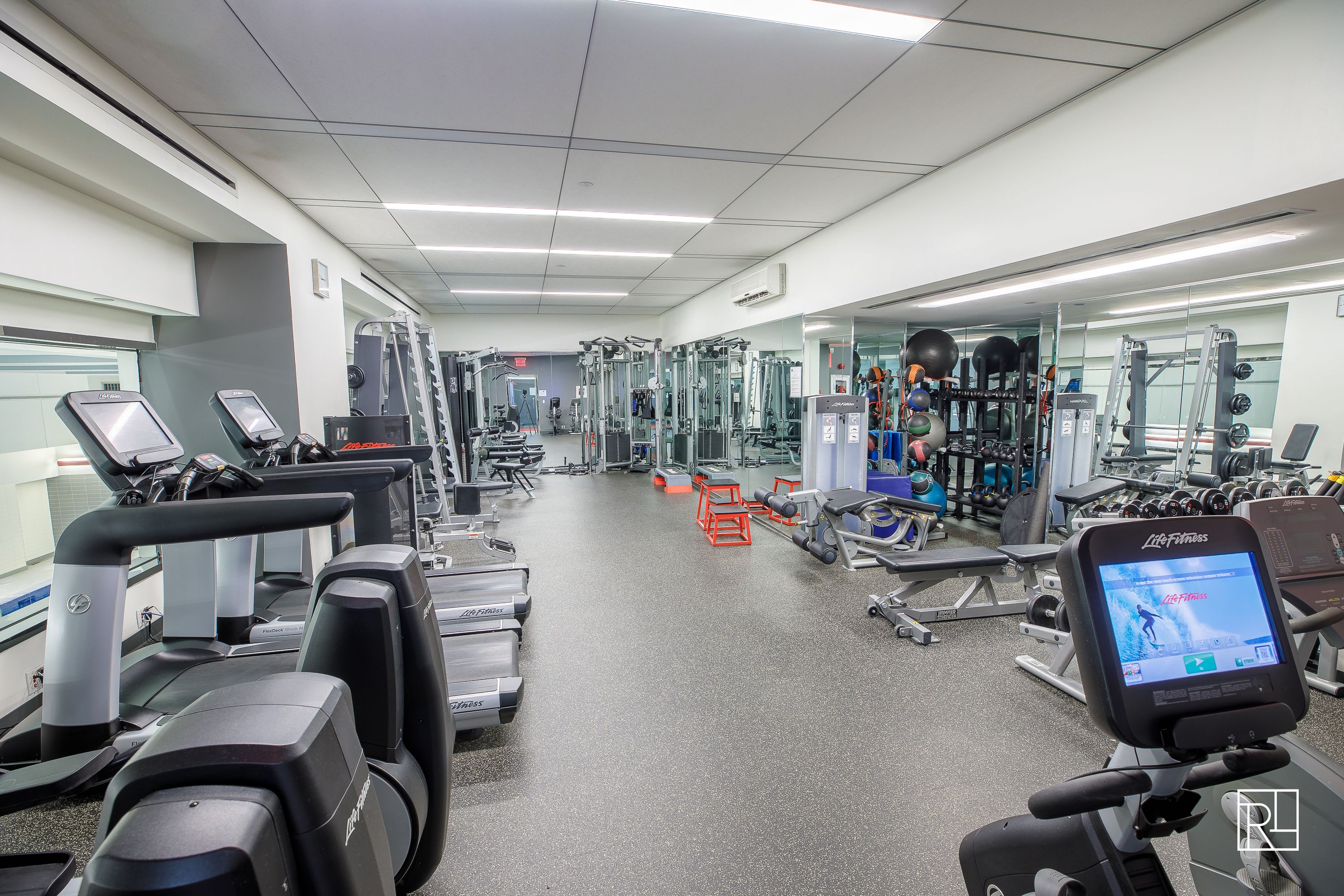 161 West 61st Street, Unit 12D Manhattan, NY 10023 - Photo 11 of 15 a view of a room with gym equipment
