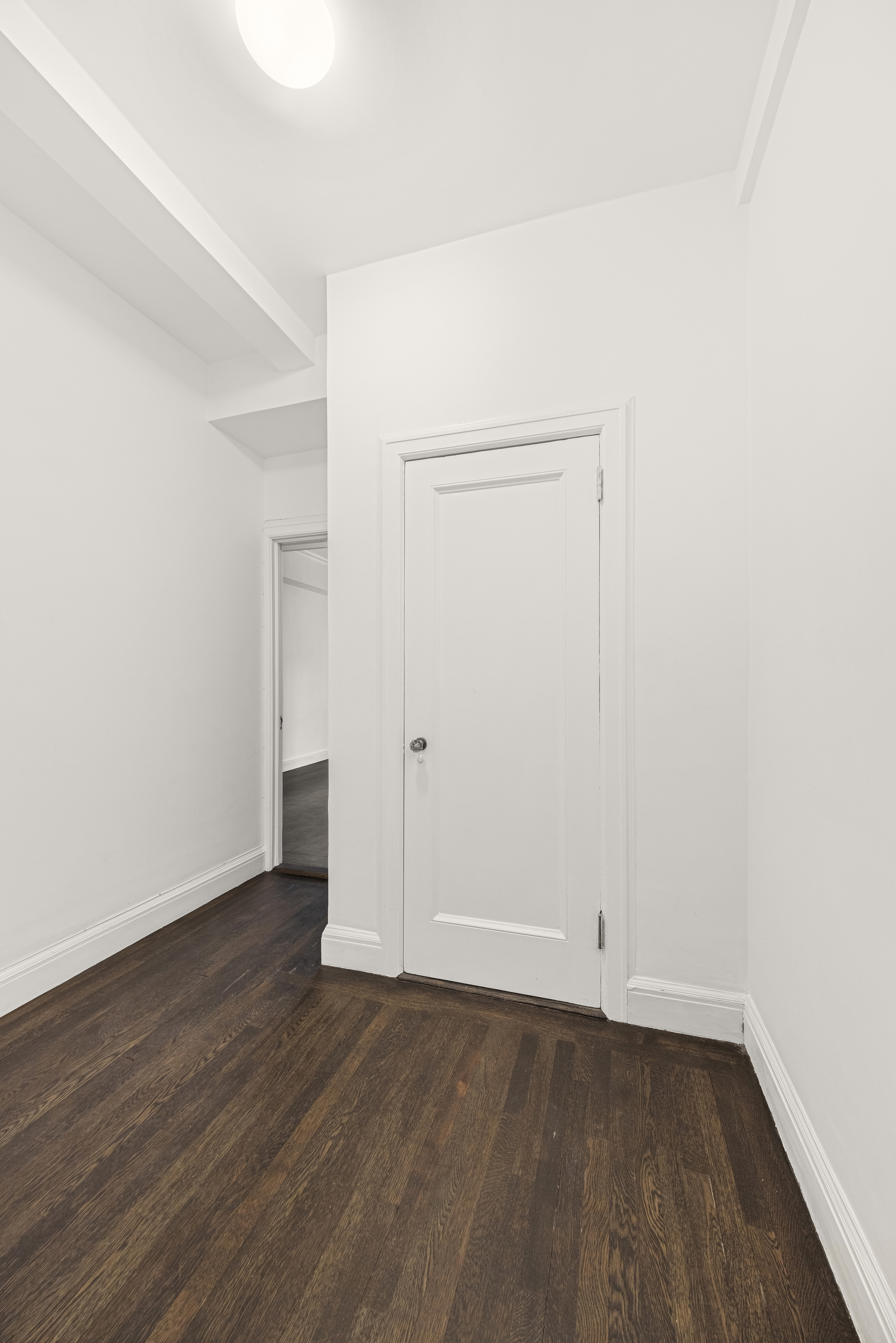 39 5th Avenue, Unit 2B Manhattan, NY 10003 - Photo 7 of 10 an empty room with wooden floor