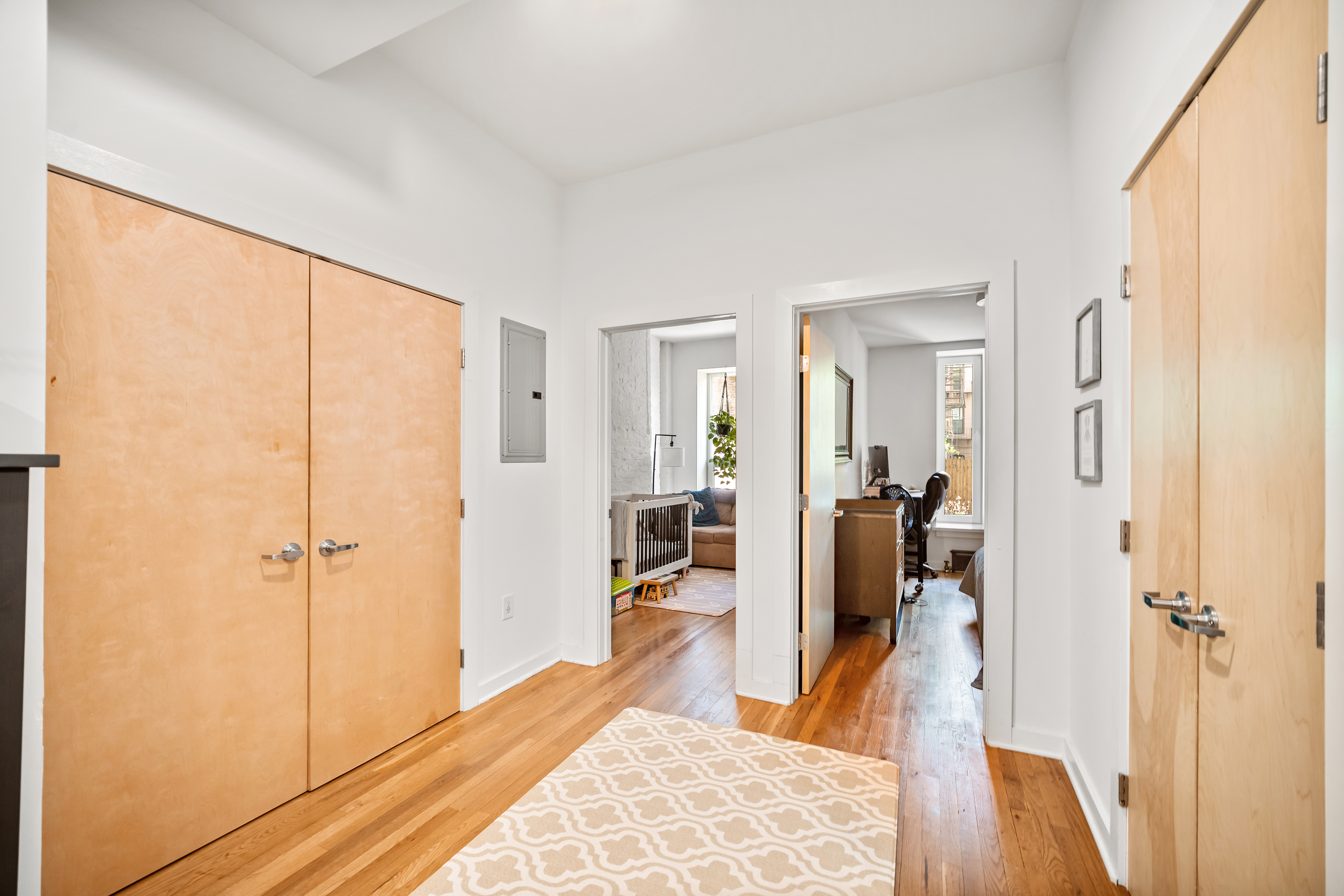 353 12th Street, Unit 2 Brooklyn, NY 11215 - Photo 3 of 17 a view of a bedroom with wooden floor and bedroom view