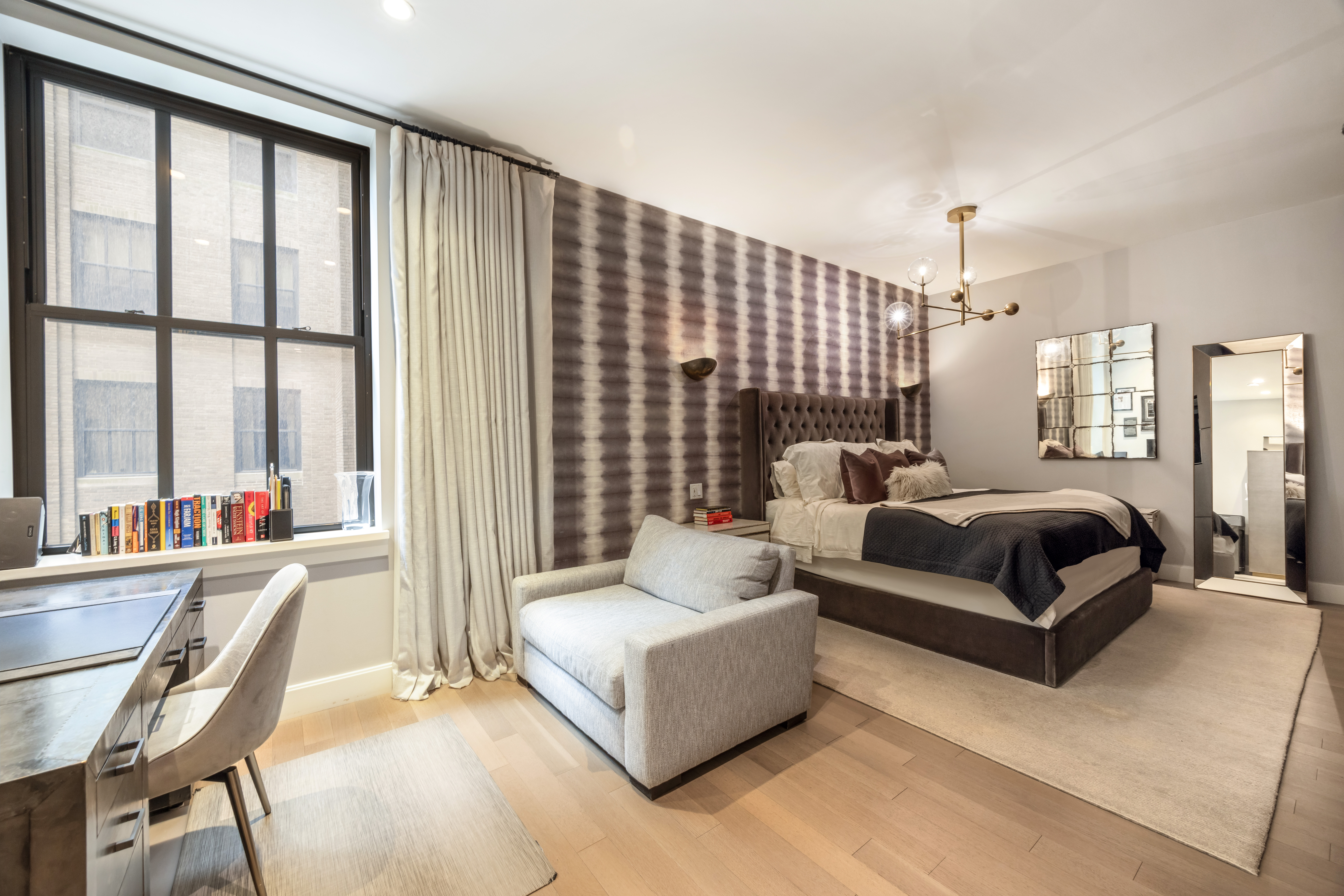 100 Barclay Street, Unit 13G Manhattan, NY 10007 - Photo 5 of 26 a living room with furniture and a large window
