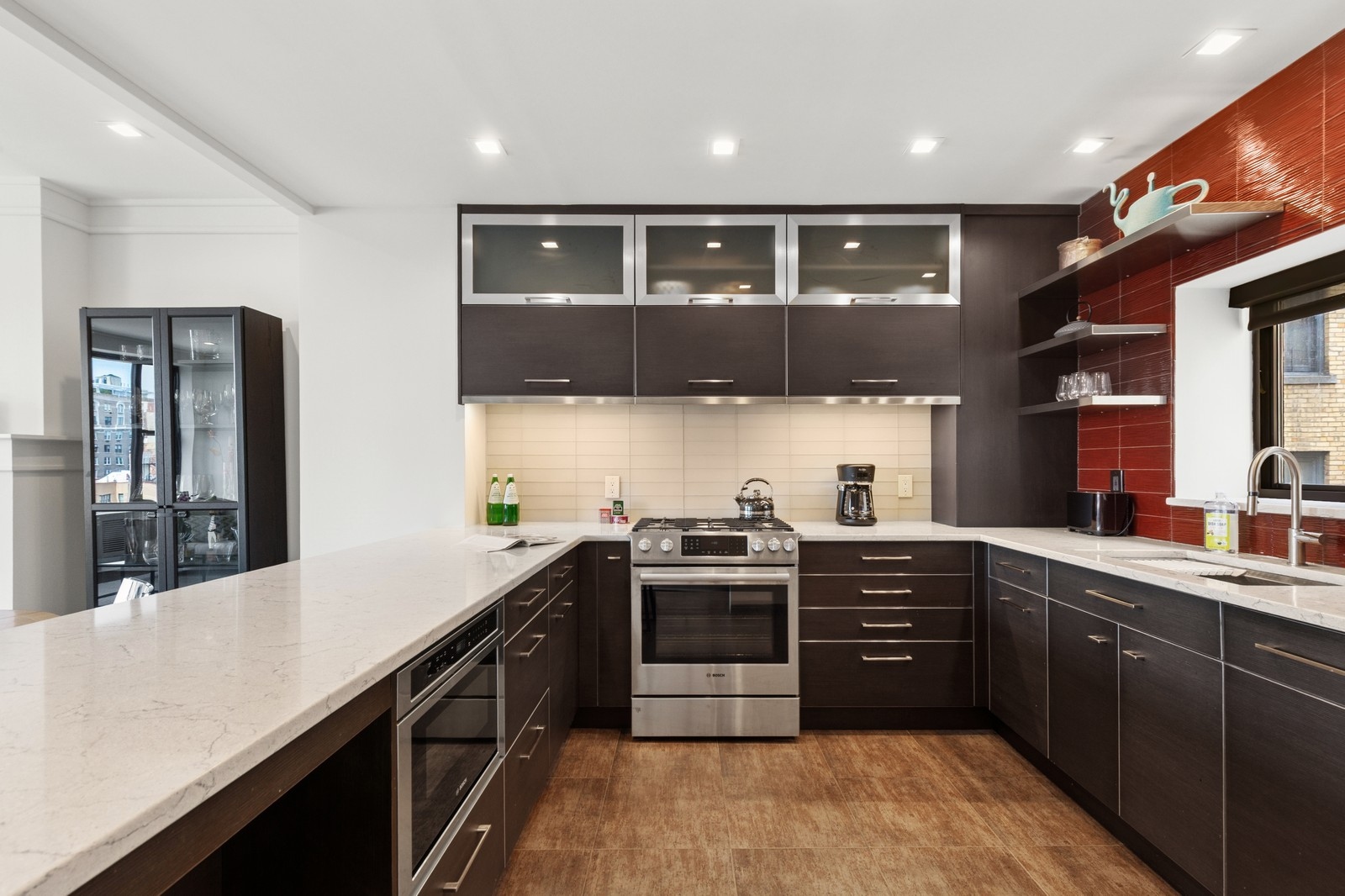309 West 86th Street, Unit 11B Manhattan, NY 10024 - Photo 3 of 13 a kitchen with stainless steel appliances granite countertop a sink a stove and a refrigerator