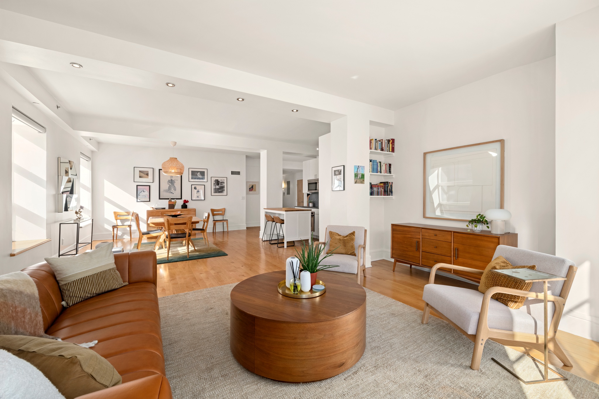 57 Front Street, Unit 303 Brooklyn, NY 11201 - Photo 1 of 15 a living room with furniture and a wooden floor