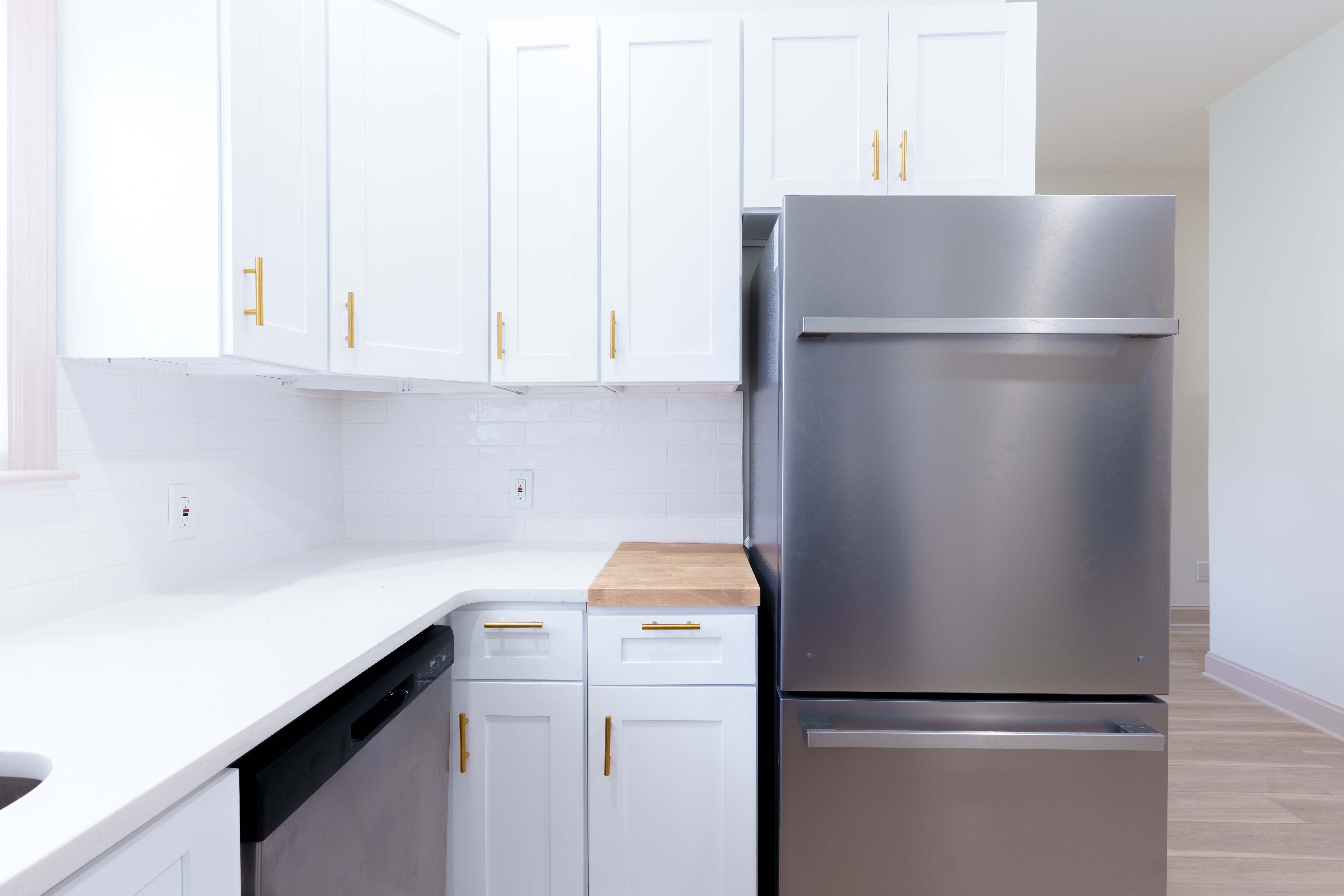 415 North Haddon Avenue Haddonfield, NJ 08033 - Photo 19 of 23 a white refrigerator freezer sitting in a kitchen