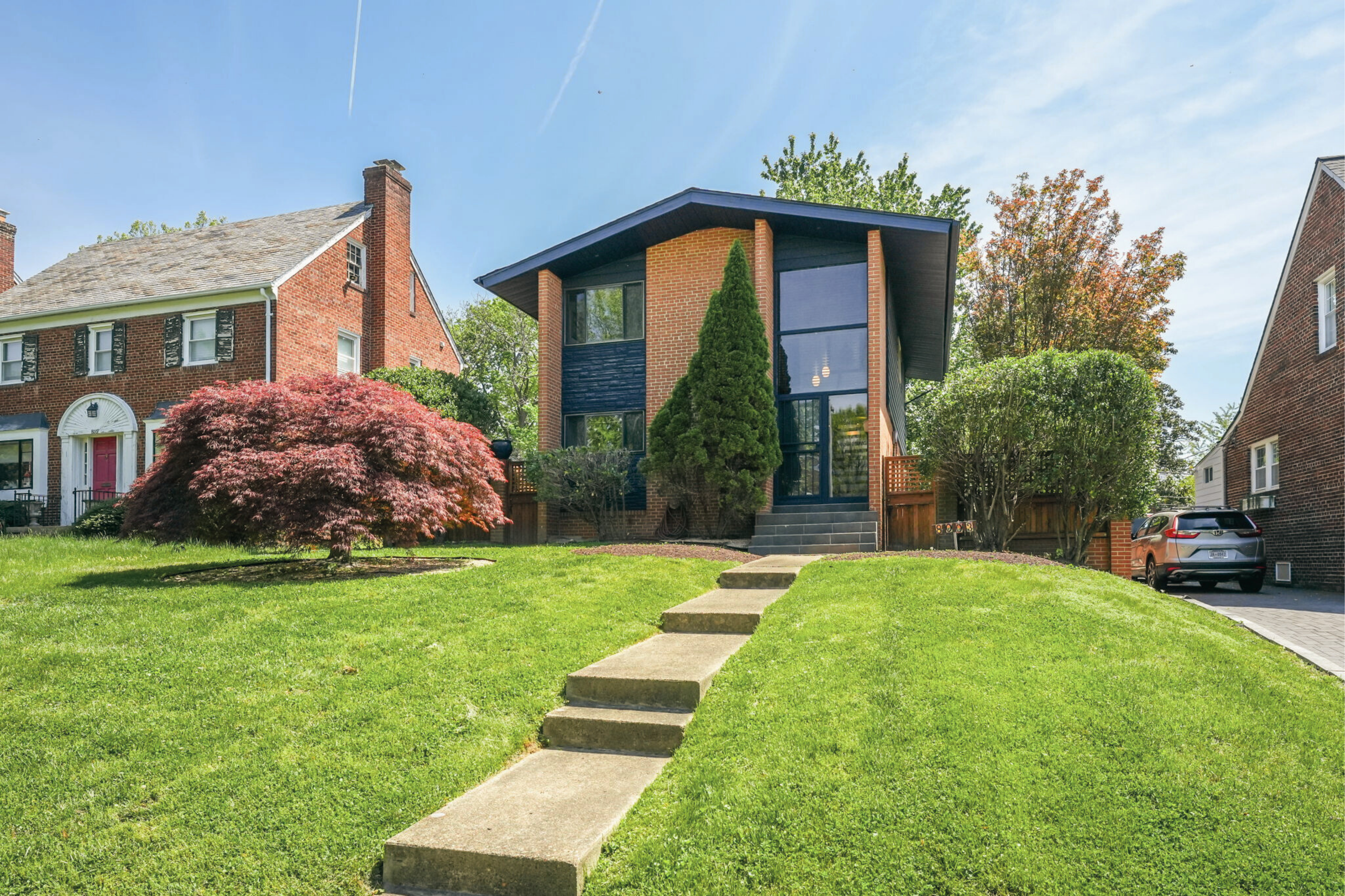 8003 16th Street Northwest Washington, DC 20012 - Photo 2 of 38 a view of a house with backyard and garden