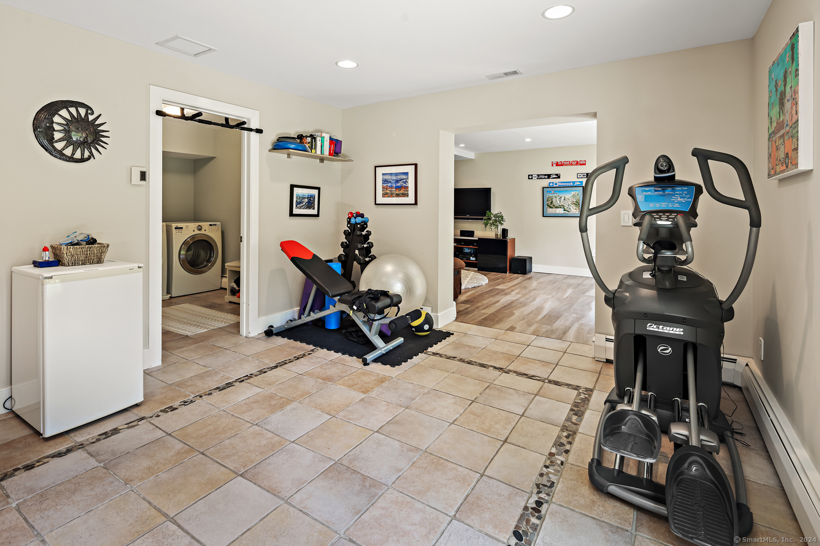 13 Bittersweet Road Weston, CT 06883 - Photo 24 of 35 a view of a room with gym equipment
