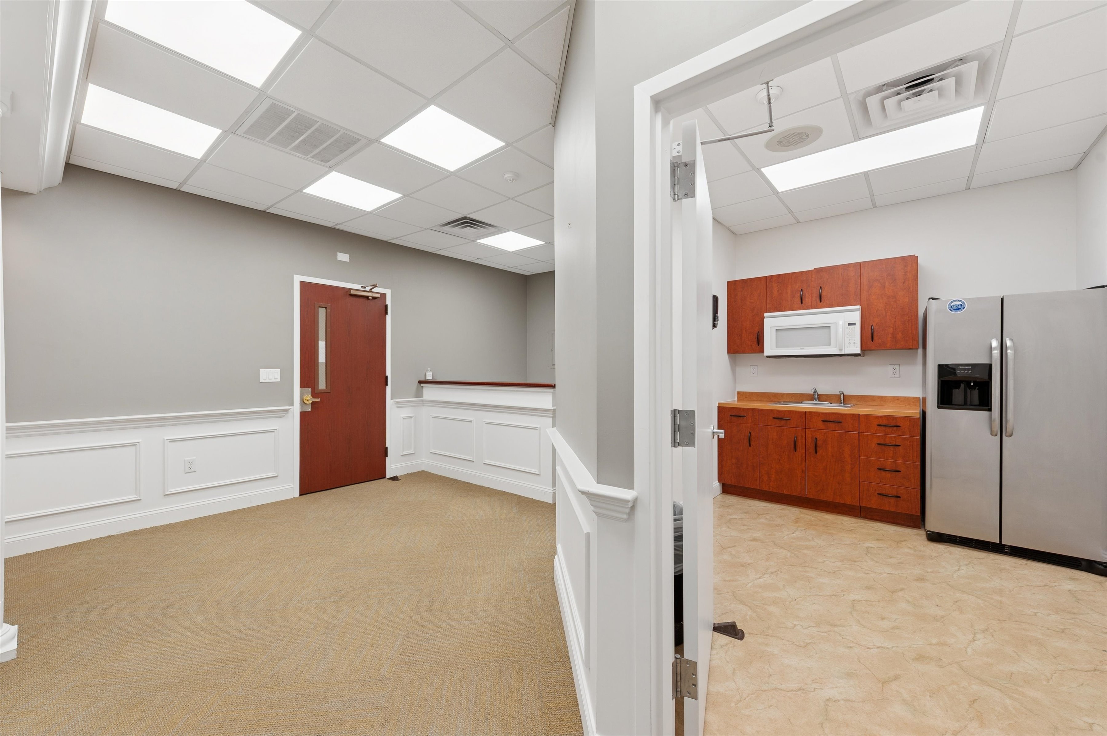 300 Pantigo Road East Hampton, NY 11937 - Photo 6 of 18 a view of kitchen with refrigerator and window