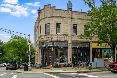 a front view of a building with street