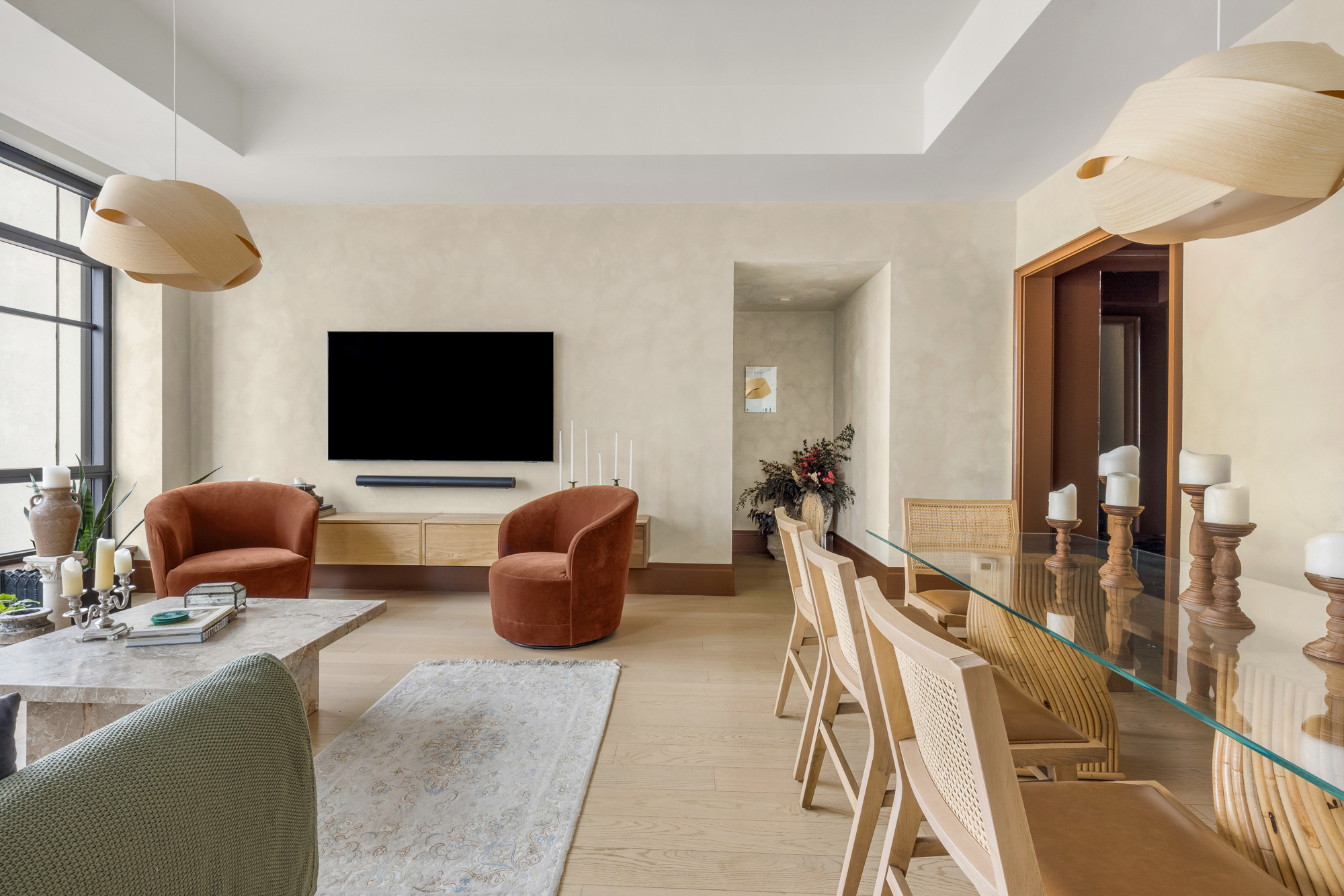 25 Park Row, Unit 29A Manhattan, NY 10038 - Photo 12 of 23 a living room with furniture and a flat screen tv