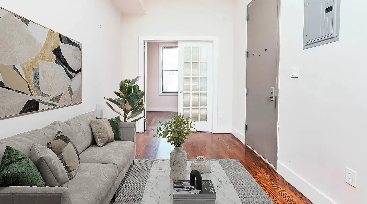 285 Cornelia Street, Unit 3R Brooklyn, NY 11221 - Photo 2 of 10 a living room with furniture and a potted plant