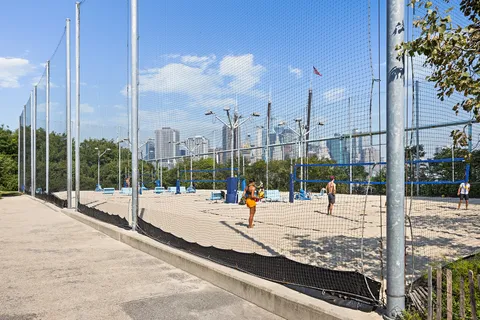a view of a playground and green space