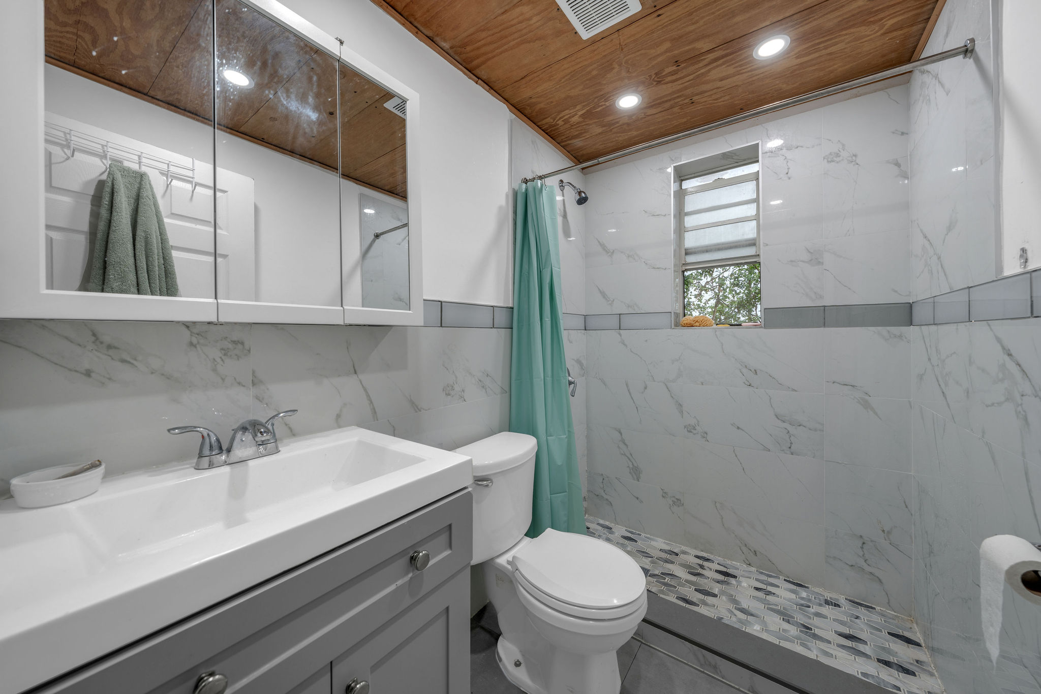 735-745 Meridian Avenue Miami Beach, FL 33139 - Photo 30 of 62 a bathroom with a sink a toilet and shower
