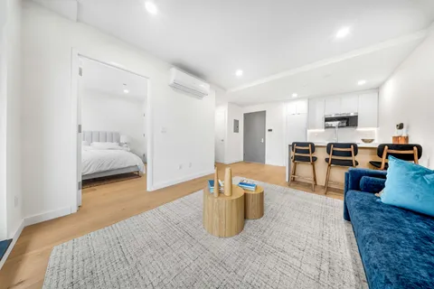 a living room with furniture and a couch