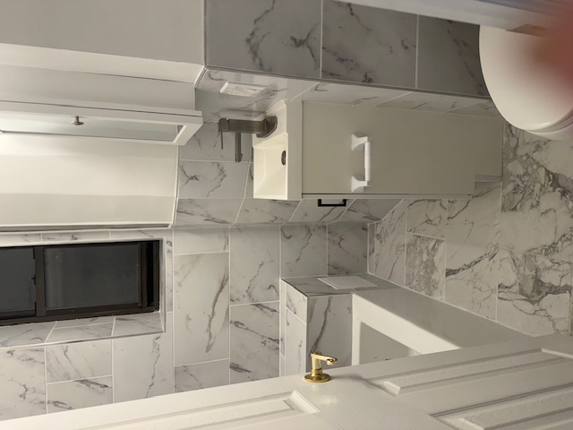 552 West 141st Street, Unit 1A Manhattan, NY 10031 - Photo 2 of 4 a bathroom with a sink toilet and shower