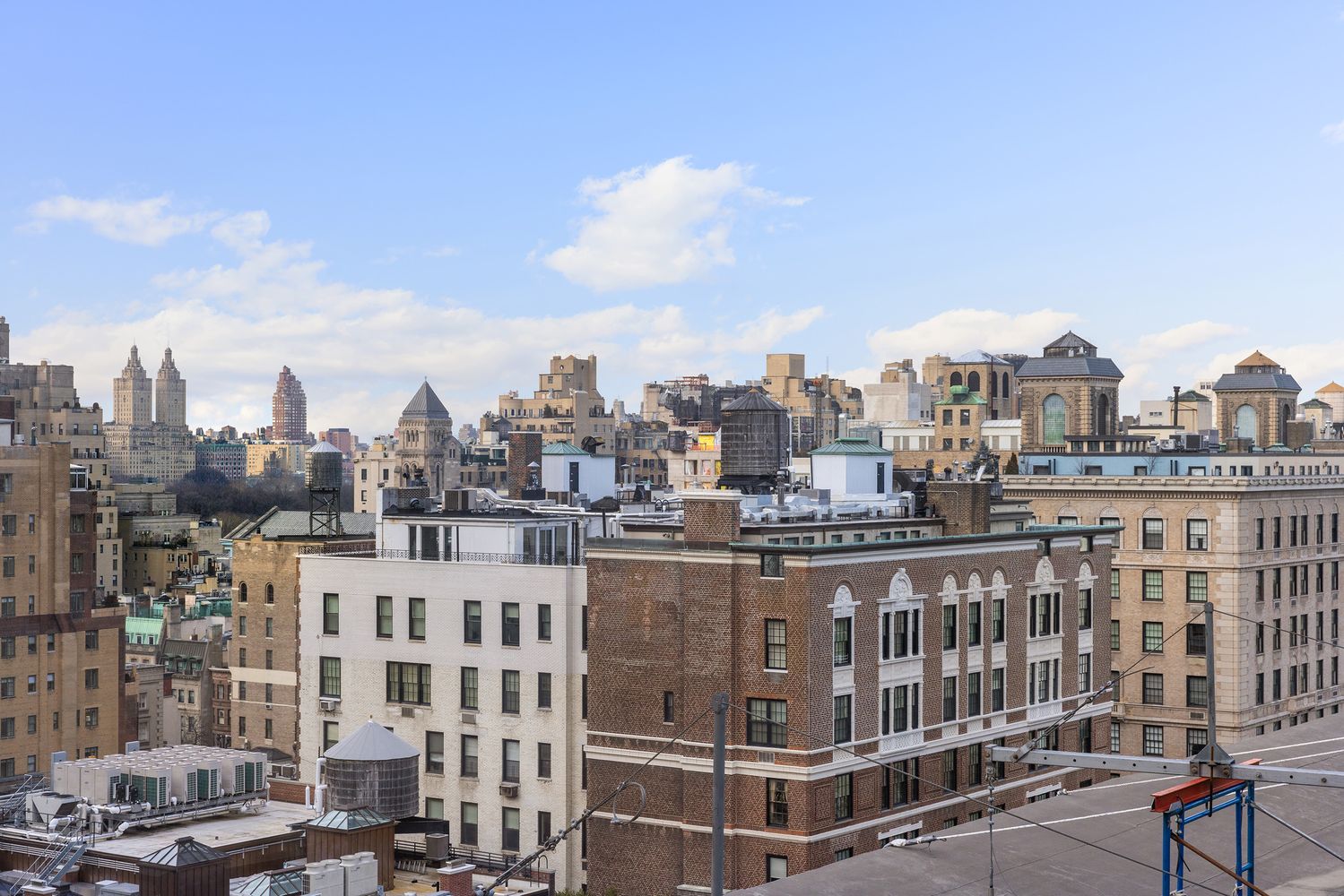 a view of city with tall buildings