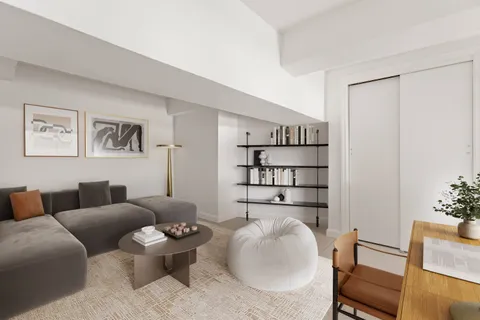 a living room with furniture and window