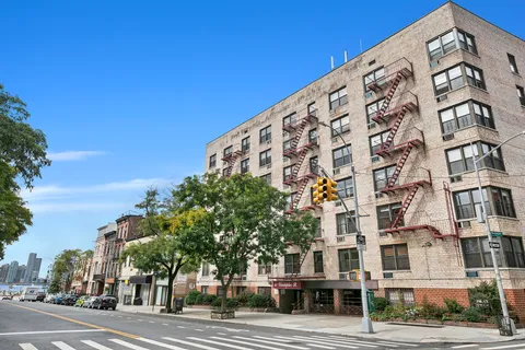 a view of a building with a street