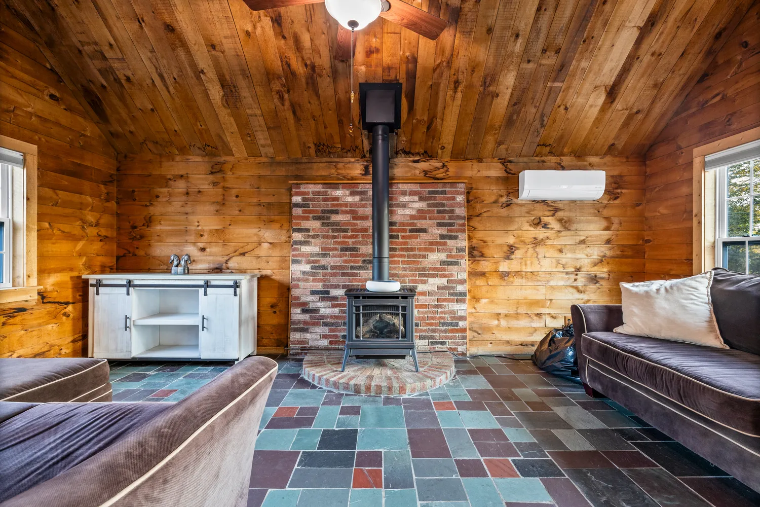 a backyard of a house with barbeque oven