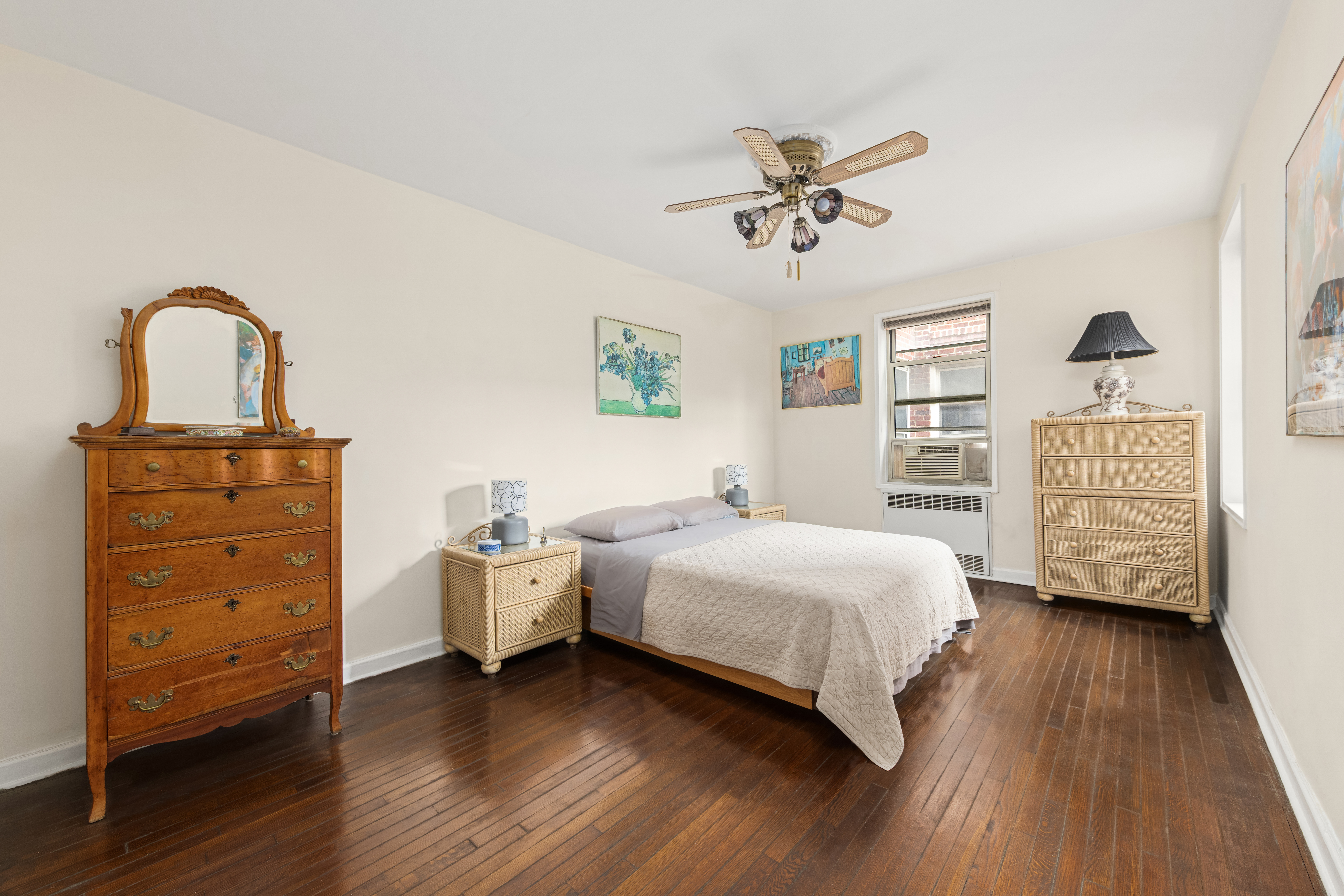 68-61 Yellowstone Boulevard, Unit 618 Queens, NY 11375 - Photo 6 of 13 a bedroom with a bed and a dresser