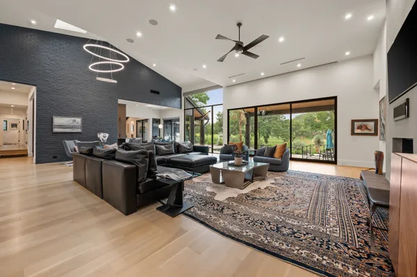 a living room with furniture and a rug