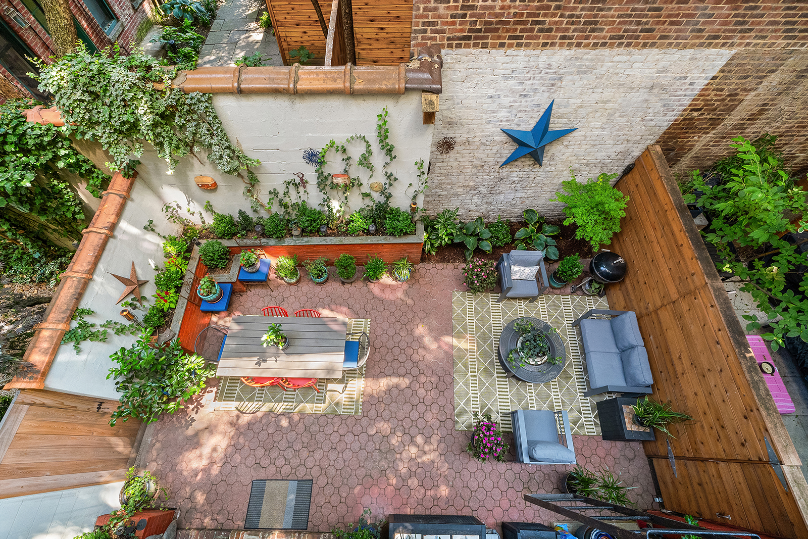 92 Horatio Street, Unit 1J Manhattan, NY 10014 - Photo 14 of 16 an aerial view of house with yard swimming pool and outdoor seating