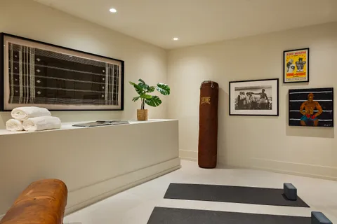 a terrace with outdoor seating and trees