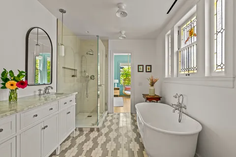 a living room with furniture and a rug