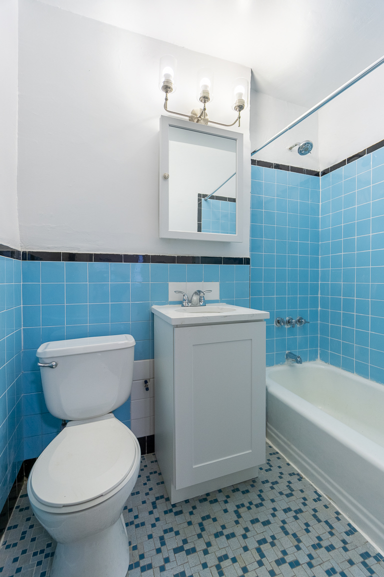 136 East 28th Street, Unit 2RE Manhattan, NY 10016 - Photo 9 of 17 a bathroom with a toilet a sink and bathtub