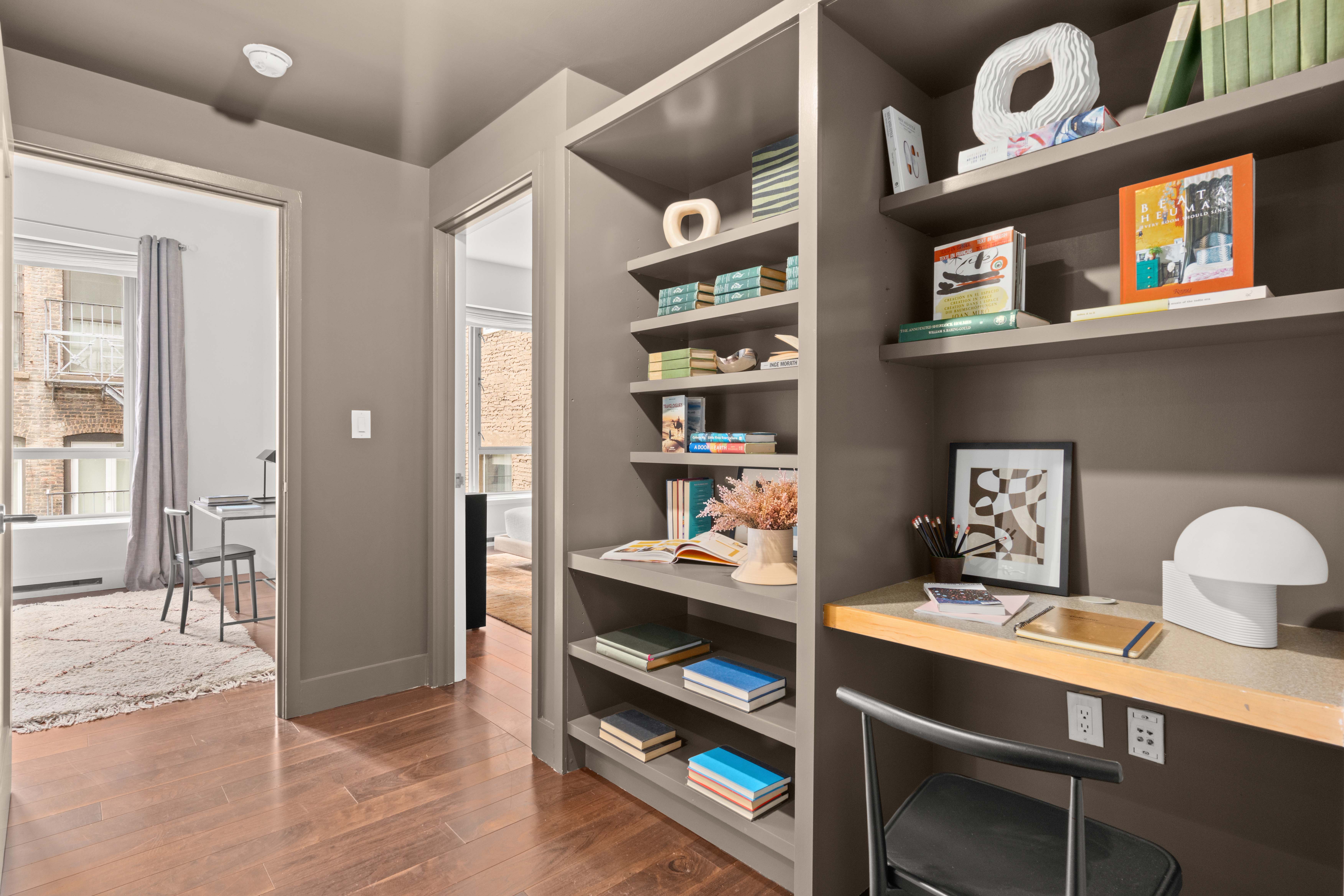 48 Bond Street, Unit 4B Manhattan, NY 10012 - Photo 11 of 15 a view of a workspace with furniture and cabinet