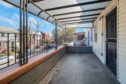 a front view of a house with garage