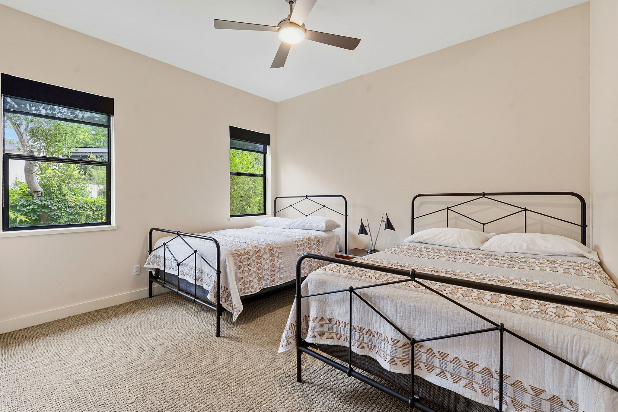 3605 Robbins Road Austin, TX 78730 - Photo 28 of 51 a spacious bedroom with two beds and window