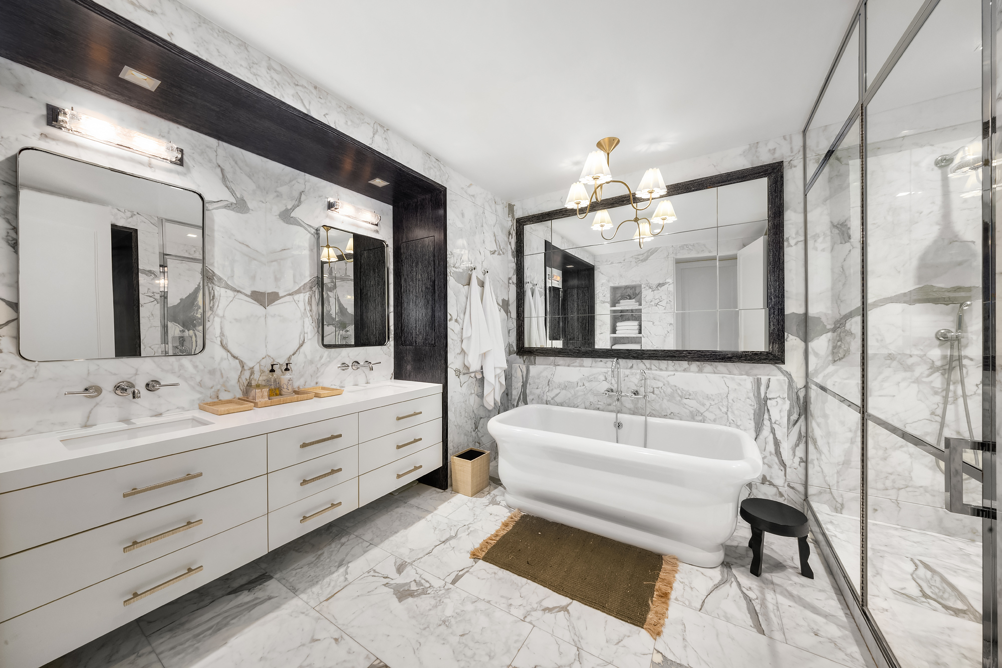 14-16 Wooster Street, Unit 2 Manhattan, NY 10013 - Photo 15 of 22 a spacious bathroom with a double vanity sink mirror and bathtub