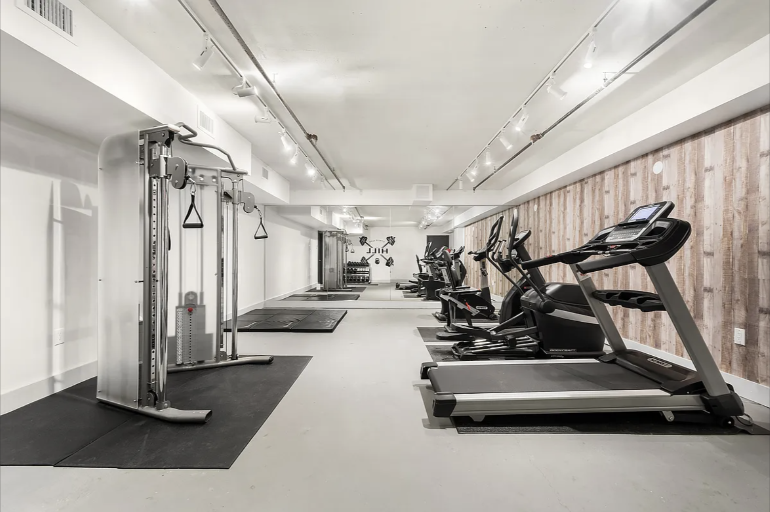 1325 Herkimer Street, Unit 302 Brooklyn, NY 11233 - Photo 6 of 10 a view of a room with gym equipment
