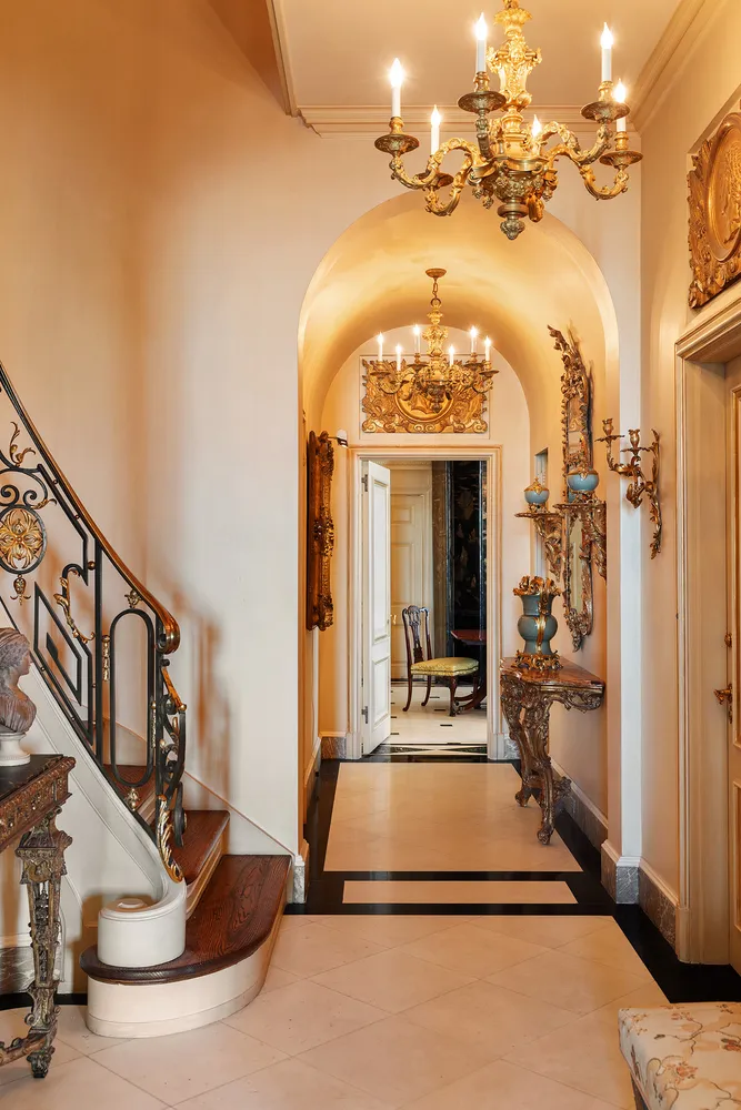a view of a hallway with a livingroom