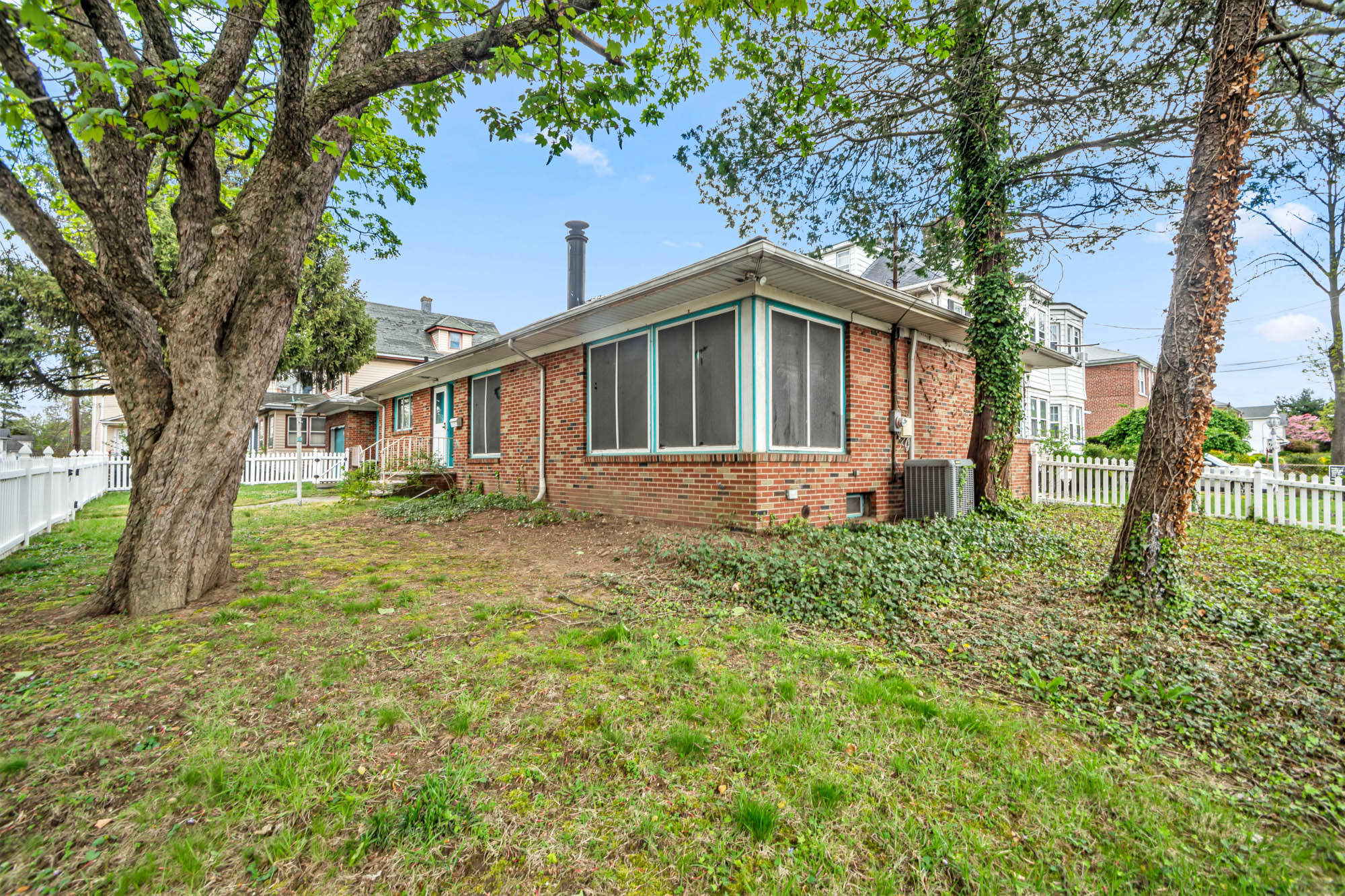 2 Livingston Court Staten Island, NY 10310 - Photo 9 of 14 a front view of a house with a yard