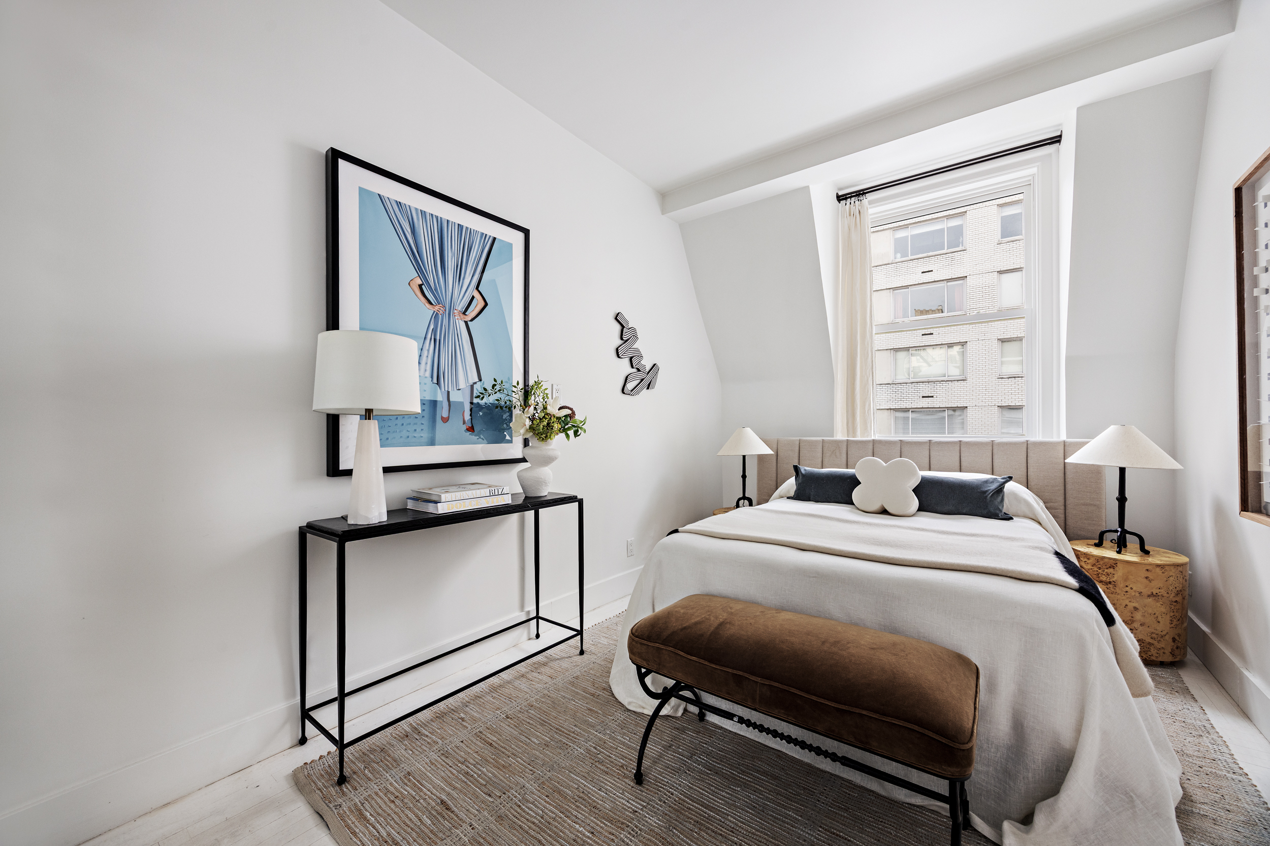 15 East 70th Street, Unit PHB Manhattan, NY 10021 - Photo 17 of 35 a bedroom with a bed a mirror and a window