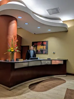 a view of room with wooden floor