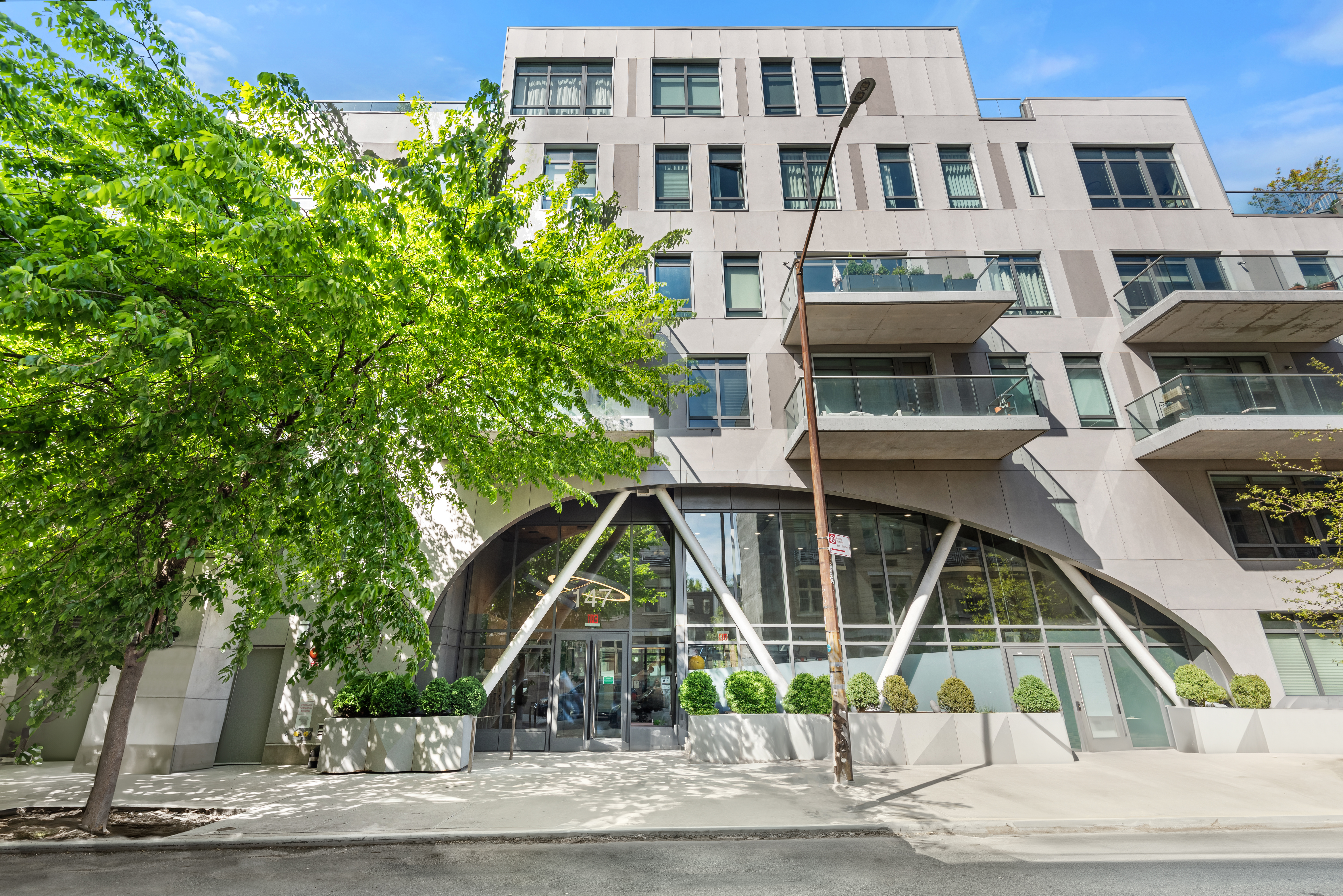 147 Hope Street, Unit 2D Brooklyn, NY 11211 - Photo 11 of 13 a view of small yard in front of house