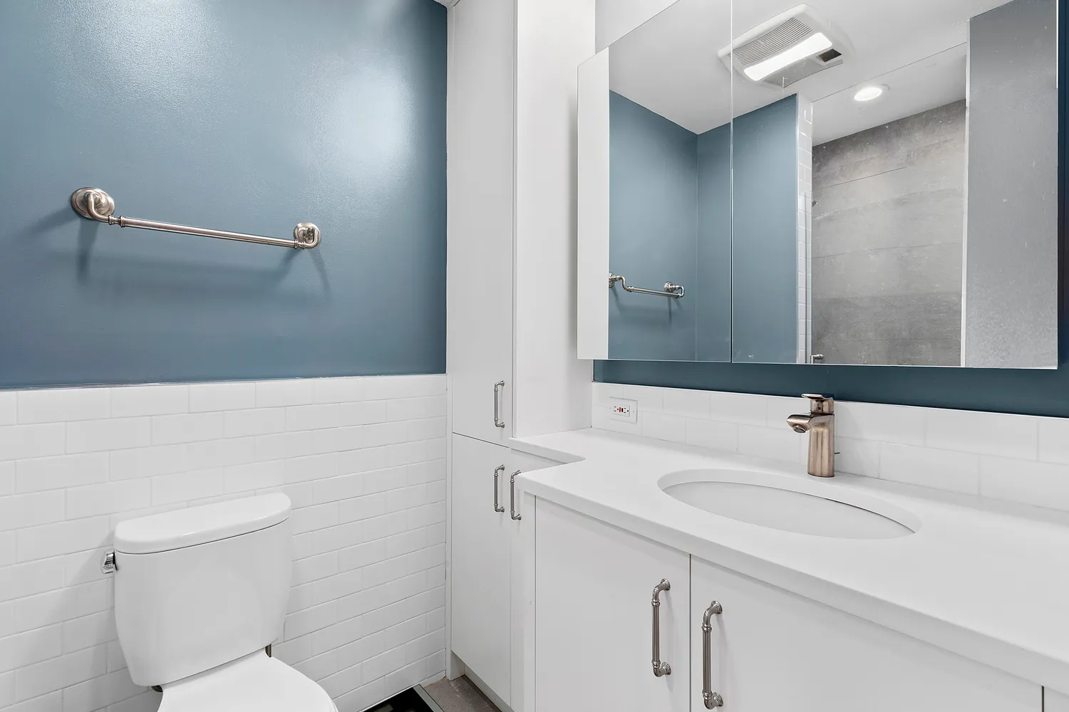 a bathroom with a sink and a toilet