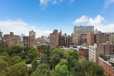 a view of a city with tall buildings