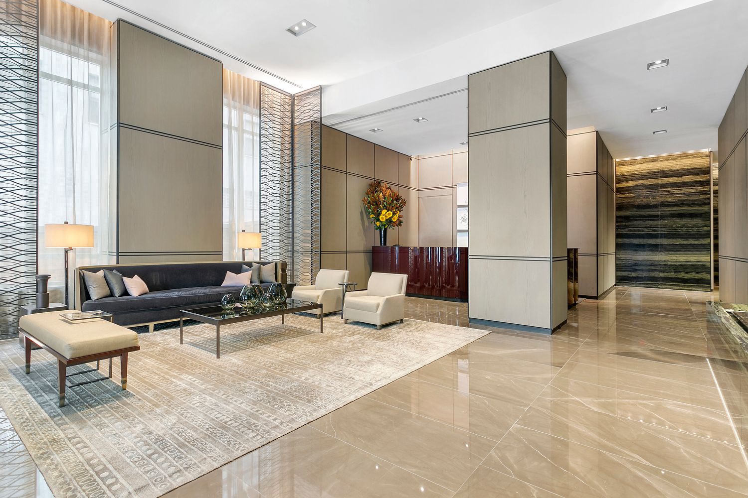 a dining room with furniture and wooden floor