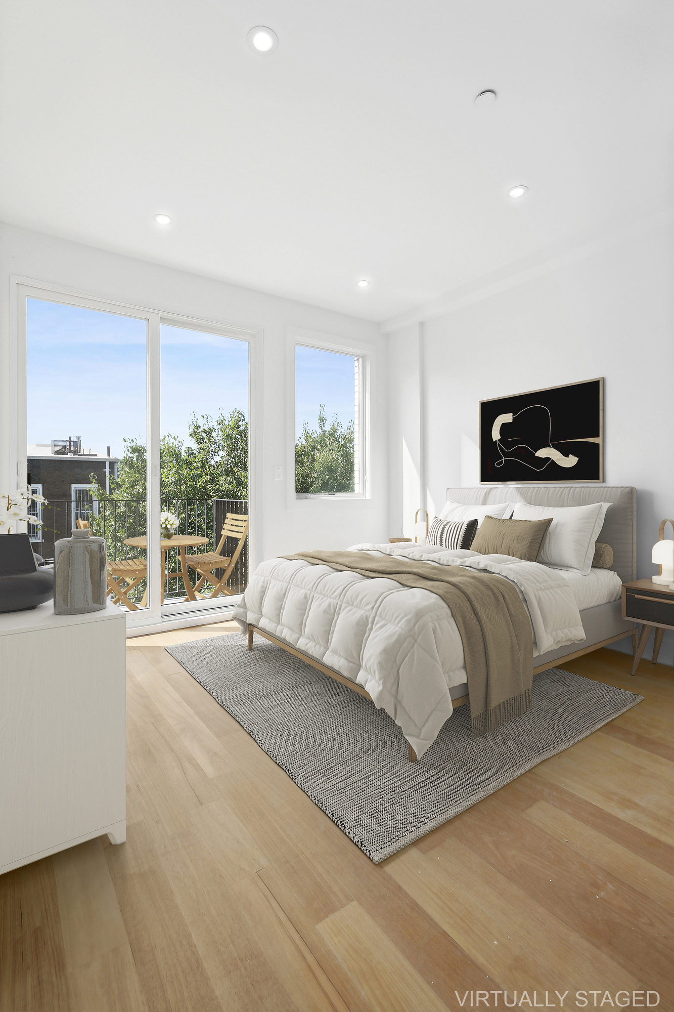 483 Hart Street, Unit 2 Brooklyn, NY 11221 - Photo 5 of 17 a bedroom with a large bed and a large window