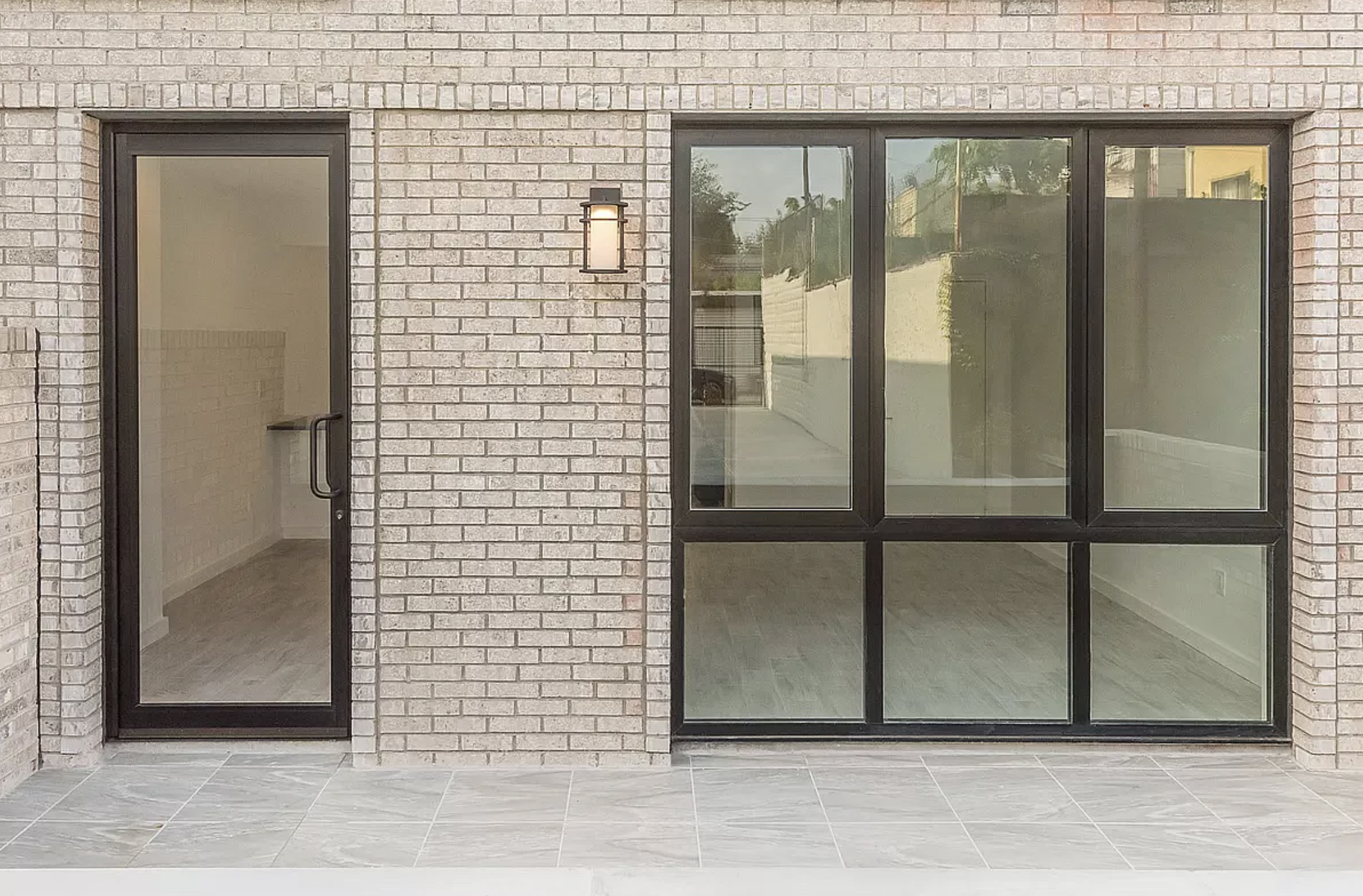 14-11 31st Avenue, Unit 1B Queens, NY 11106 - Photo 6 of 9 a view of a glass door