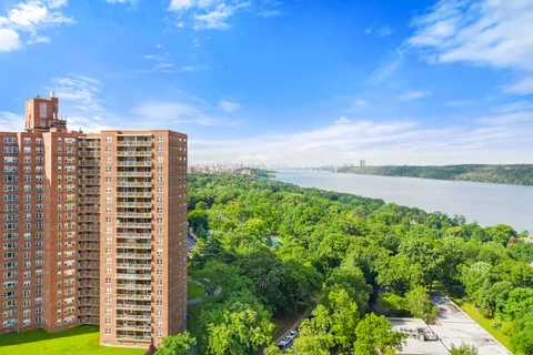a view of a city with tall buildings