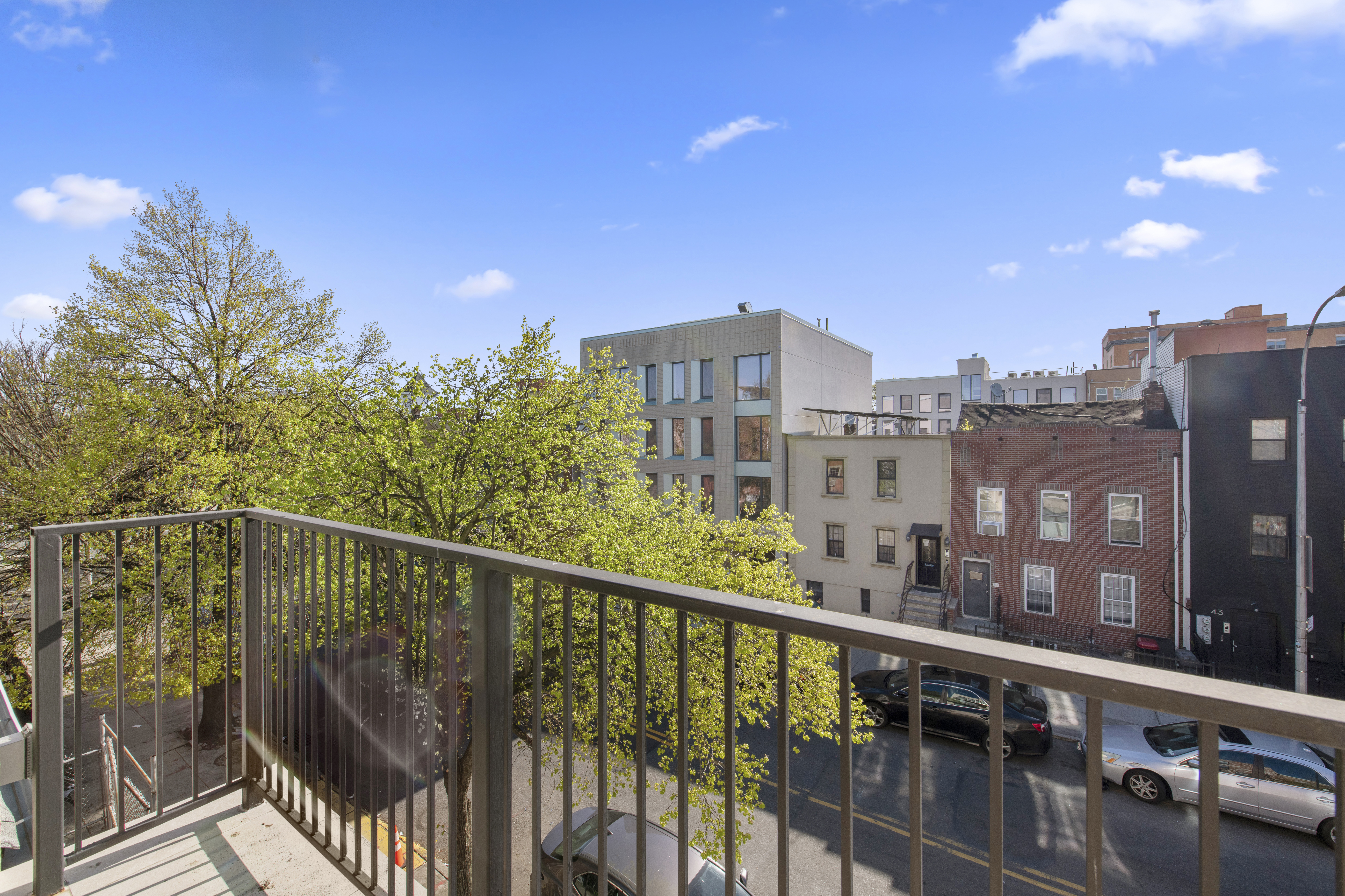 42 Rochester Avenue, Unit 3 Brooklyn, NY 11233 - Photo 6 of 18 a view of a balcony with city view
